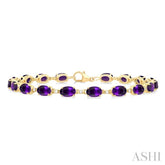6X4 MM Oval Cut Amethyst and 1/6 Ctw Round Cut Diamond Semi-Precious Tennis Bracelet in 10K Yellow Gold
